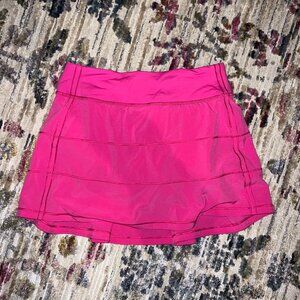 Bright pink Lululemon athletic skort